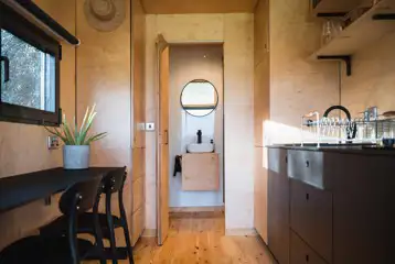 Hare glamping cabin kitchenette and ensuite bathroom with compost loo
