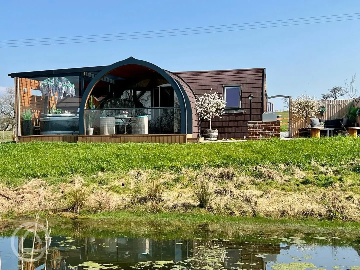 Exterior of the pod by the pond