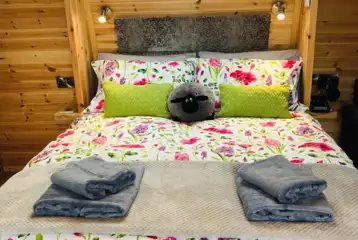 Buttercup ensuite glamping pod bedroom Buttercup ensuite glamping pod bedroom