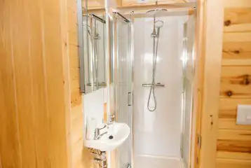 Glamping pod ensuite shower and handwashing sink