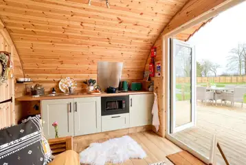 Glencroft kitchen with a microwave, grill, hob, sink and fridge Glencroft kitchen with a microwave, grill, hob, sink and fridge