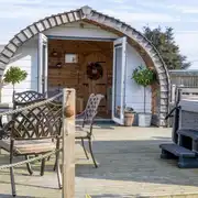 Chaplins Club pod and private decking with hot tub and BBQ