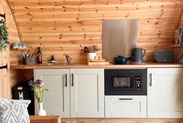 Chaplin's Club kitchen with a microwave, grill, hob, sink and fridge Chaplin's Club kitchen with a microwave, grill, hob, sink and fridge