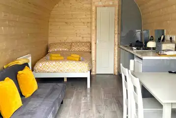 Bryn Hafod glamping pod interior with a double bed (bedding included) Bryn Hafod glamping pod interior with a double bed (bedding included)