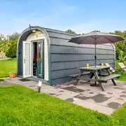Ensuite glamping pods at Anglesey Holiday Pods with a private patio and seating Ensuite glamping pods at Anglesey Holiday Pods with a private patio and seating