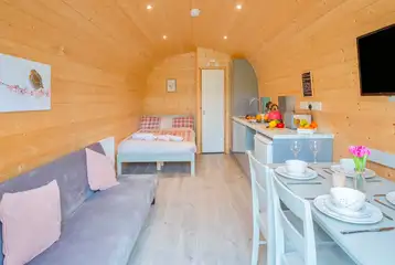 Cuddfan ensuite pod with a double bed and double sofa bed (bedding included) Cuddfan ensuite pod with a double bed and double sofa bed (bedding included)