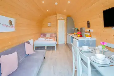 Cuddfan ensuite pod with a double bed and double sofa bed (bedding included)