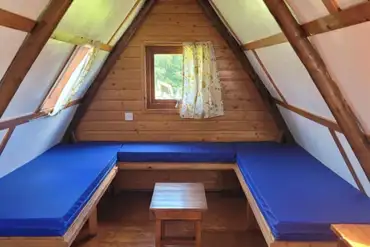 Apex glamping pod interior with five fold out beds