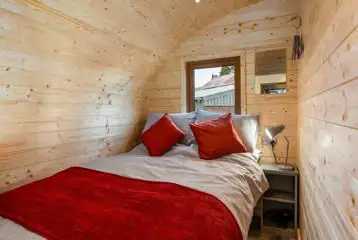 Carrock View Glamping Pod bedroom with a double bed