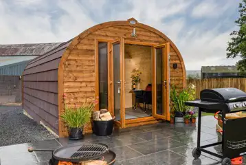 Carrock View Glamping Pod with an outdoor BBQ and fire pit