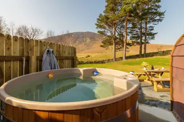 wood fired hot tub in the glamping pods at Carrock Glamping Pods