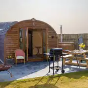 Carrock Sunset Glamping Pod featuring a fire pit, BBQ, and picnic bench Carrock Sunset Glamping Pod featuring a fire pit, BBQ, and picnic bench