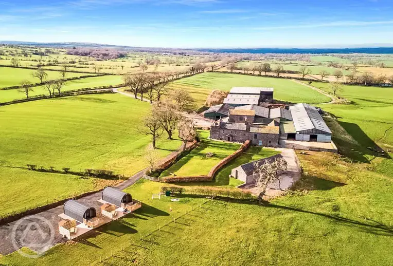 Aerial view of Hardrigg Hall Glamping and the Cumbrian countryside