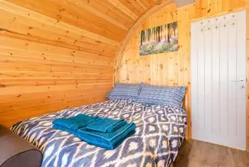 Glamping pod double bed with linen and towels provided Glamping pod double bed with linen and towels provided