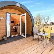 Bluebell glamping pod exterior with private decking area and outdoor seating