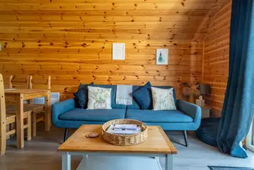 Ensuite glamping pod living area with TV (pet-free)