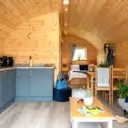 Glamping pod with hot tub interior