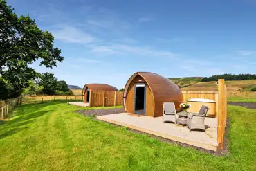 Glamping pods with private decking and hot tubs