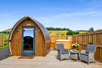 Ensuite glamping pod with a wood-fired hot tub at Peel Farm