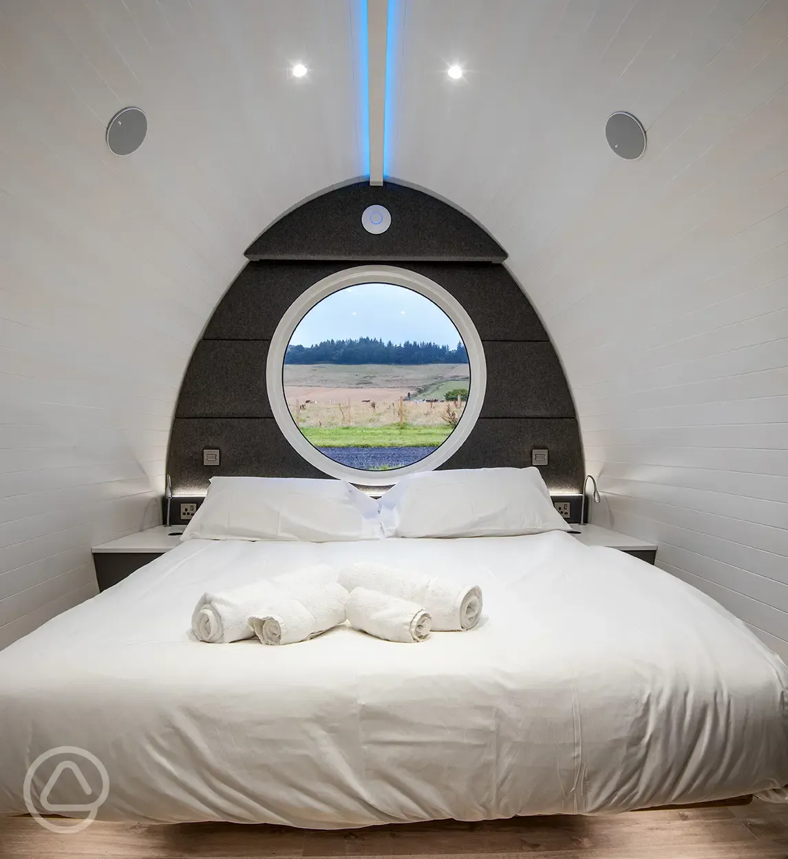 Premium glamping pod king size bed