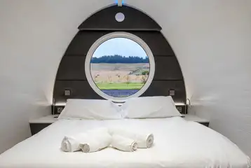 Premium ensuite glamping pod with a king bed (bedding provided) at Peel Farm