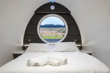 Premium ensuite glamping pod with a king bed (bedding provided) at Peel Farm