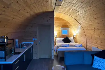 Ensuite glamping pod interior at night Ensuite glamping pod interior at night