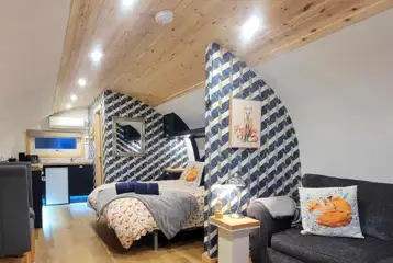 The Fox's Den lounge and bedroom area The Fox's Den lounge and bedroom area