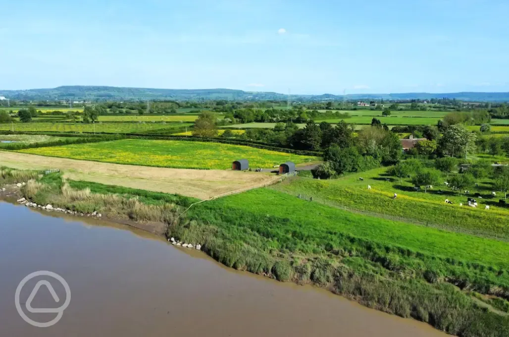 Aerial of the pods on the banks of the River Severn