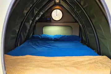 The double bed inside the Lil' Cockup small Landpod (bedding included) The double bed inside the Lil' Cockup small Landpod (bedding included)