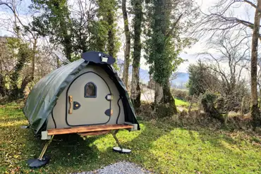  Insulated Lil' Cockup small Landpod surrounded by trees and woodland