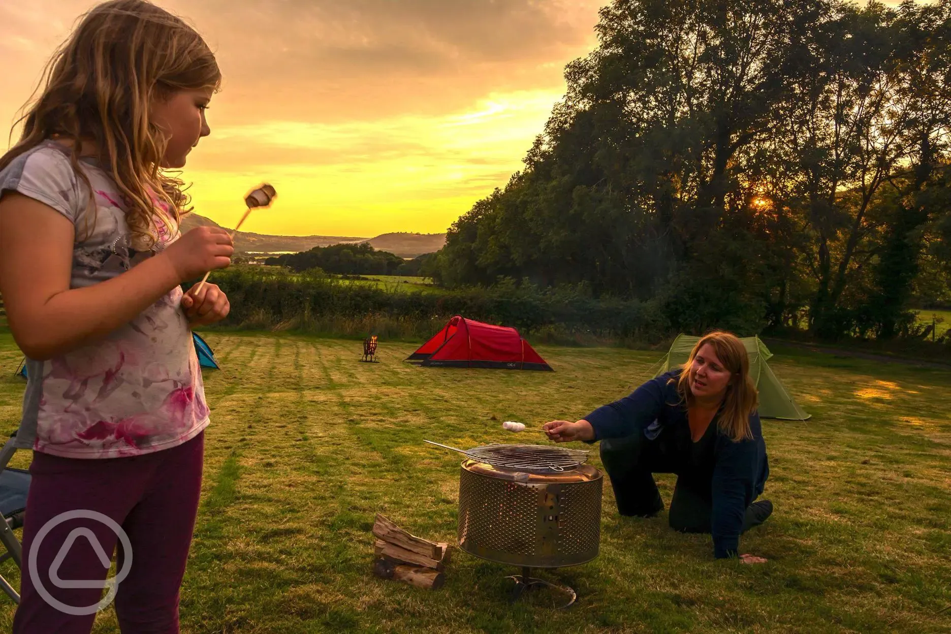 Fire pit at Kestrel Lodge Campsite