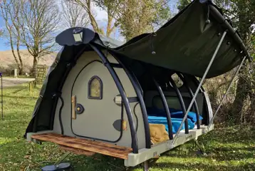 Lil' Cockup small Landpod with its roof raised up Lil' Cockup small Landpod with its roof raised up