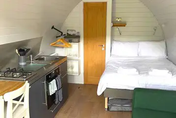 Gold glamping pod interior