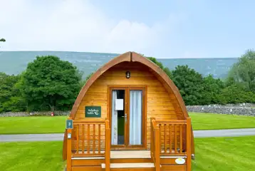 Silver glamping pod