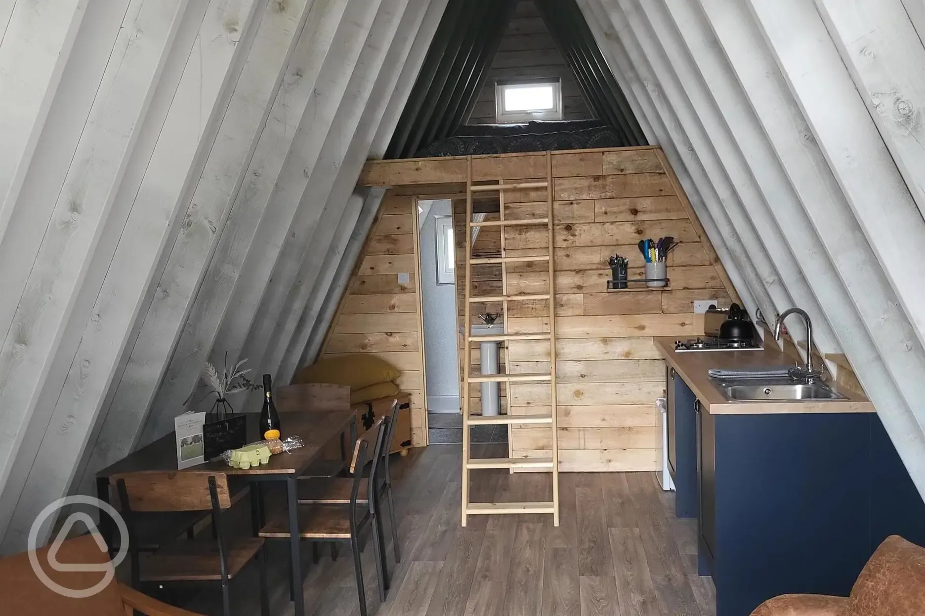 Six person glamping cabin open living space