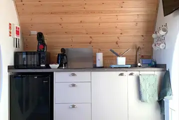 Pod kitchen with a hob, fridge, microwave, kettle, coffee maker, toaster Pod kitchen with a hob, fridge, microwave, kettle, coffee maker, toaster