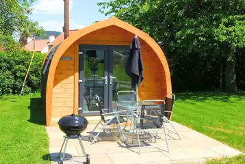 Ensuite glamping pod and outdoor seating and BBQ