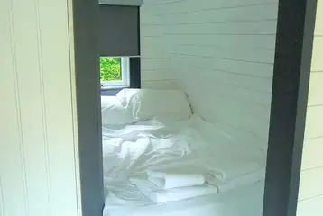 Double bed in the ensuite glamping pods (bedding and towels included)