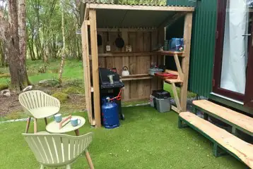 Glamping cabin outdoor cooking area Glamping cabin outdoor cooking area