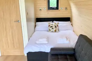 Glamping pod double bed and double sofa bed for kids