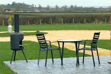 Glamping pod outdoor area and BBQ
