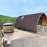 Glamping pod exterior with optional hot tub