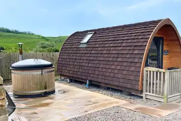 Glamping pod exterior with optional hot tub Glamping pod exterior with optional hot tub