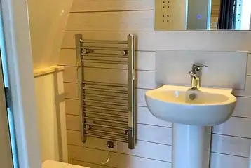 Glamping pod ensuite bathroom with toilet and shower Glamping pod ensuite bathroom with toilet and shower
