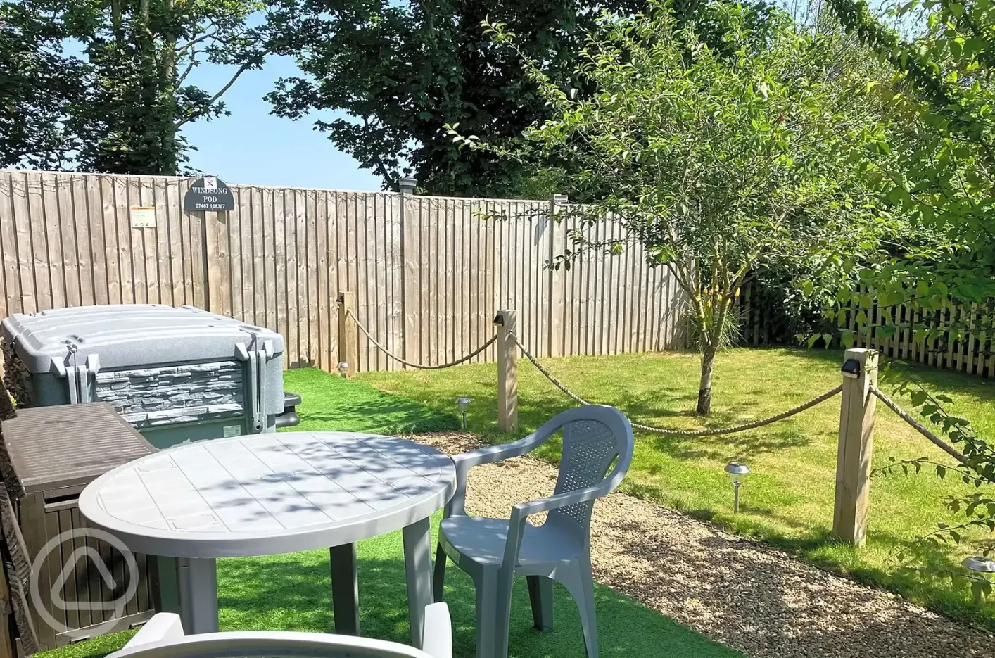 Windsong glamping pod outdoor seating and hot tub