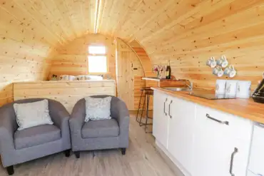Embden glamping pod kitchenette and view towards the bed area