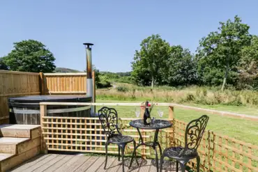 Embden glamping pod hot tub and outdoor seating area
