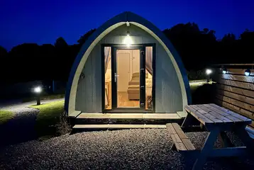 Pod lit up at night Pod lit up at night