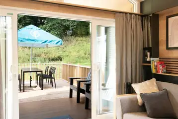 Superior glamping cabin view to the deck area